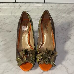 Poetic License Snakeskin Pumps